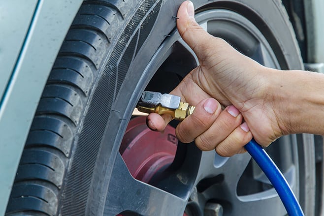 Performing routine safety check on car