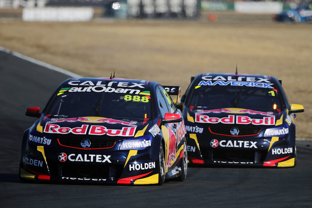 Jamie Whincup in pursuit at Queensland Raceway