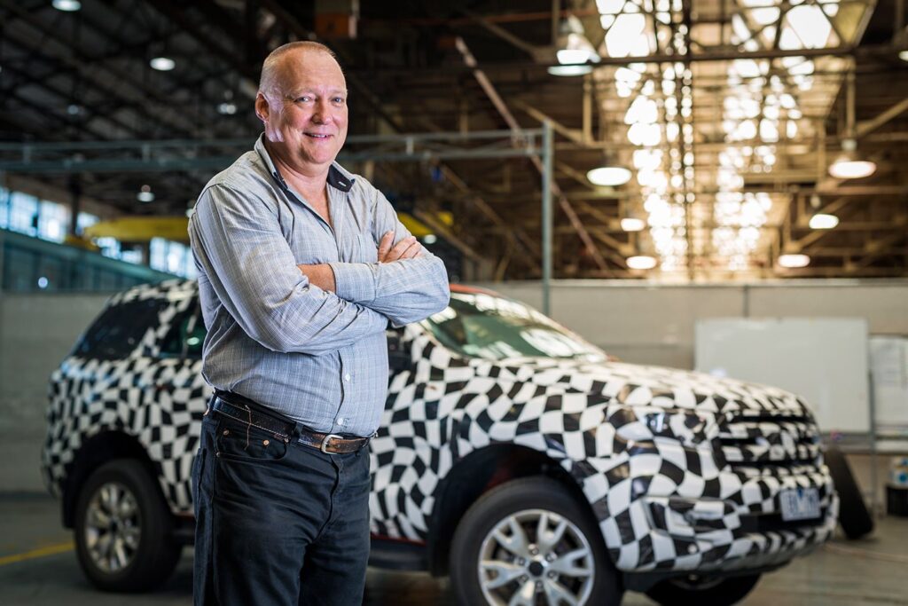 Neil Trickey with a camouflaged prototype Ford Everest