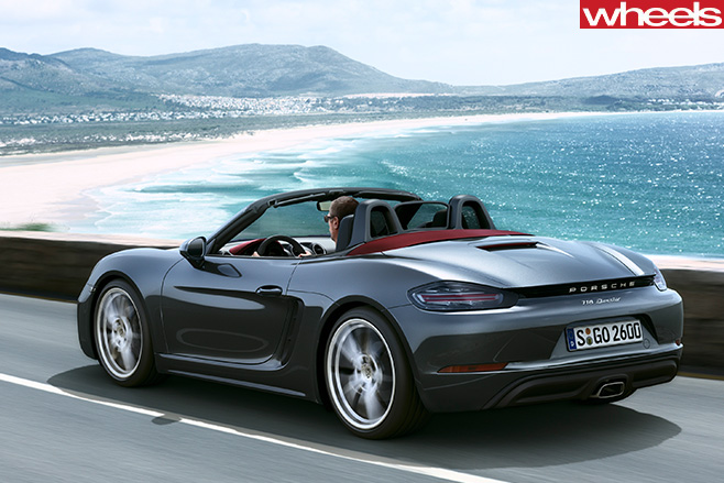 Grey -Porsche -Boxster -driving -rear