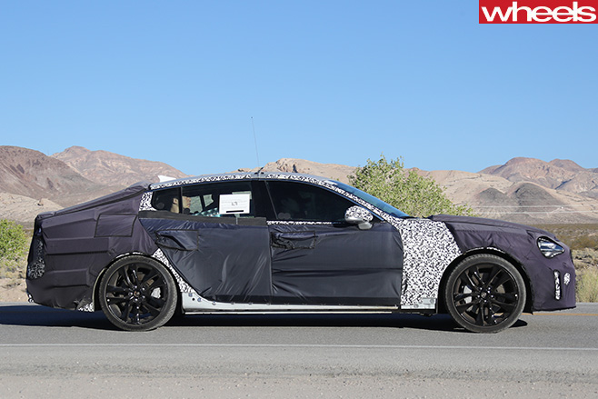 2017-Kia -GT-side -driving