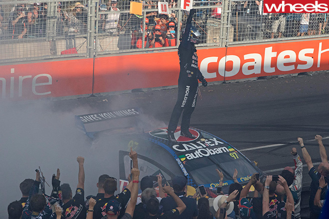 Van Gisbergen stands on car