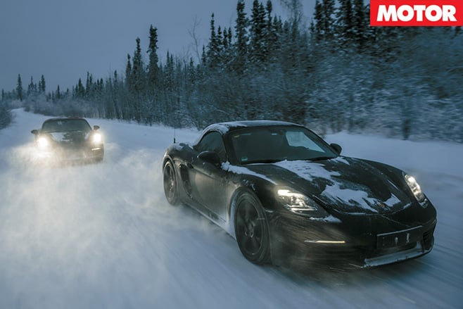 Porsche 718 Boxsters driving in snow