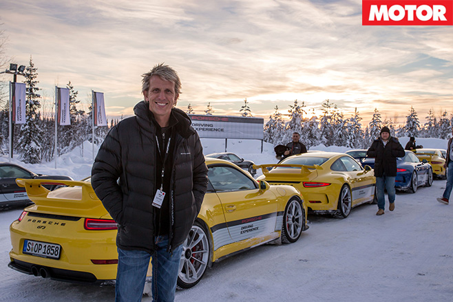 Porsches lined up in the -snow