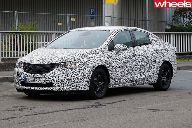 2017-Opel -Astra -sedan -spy -driving