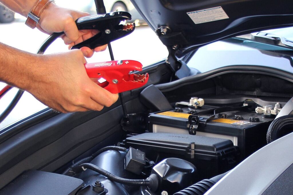 car battery and jumper leads