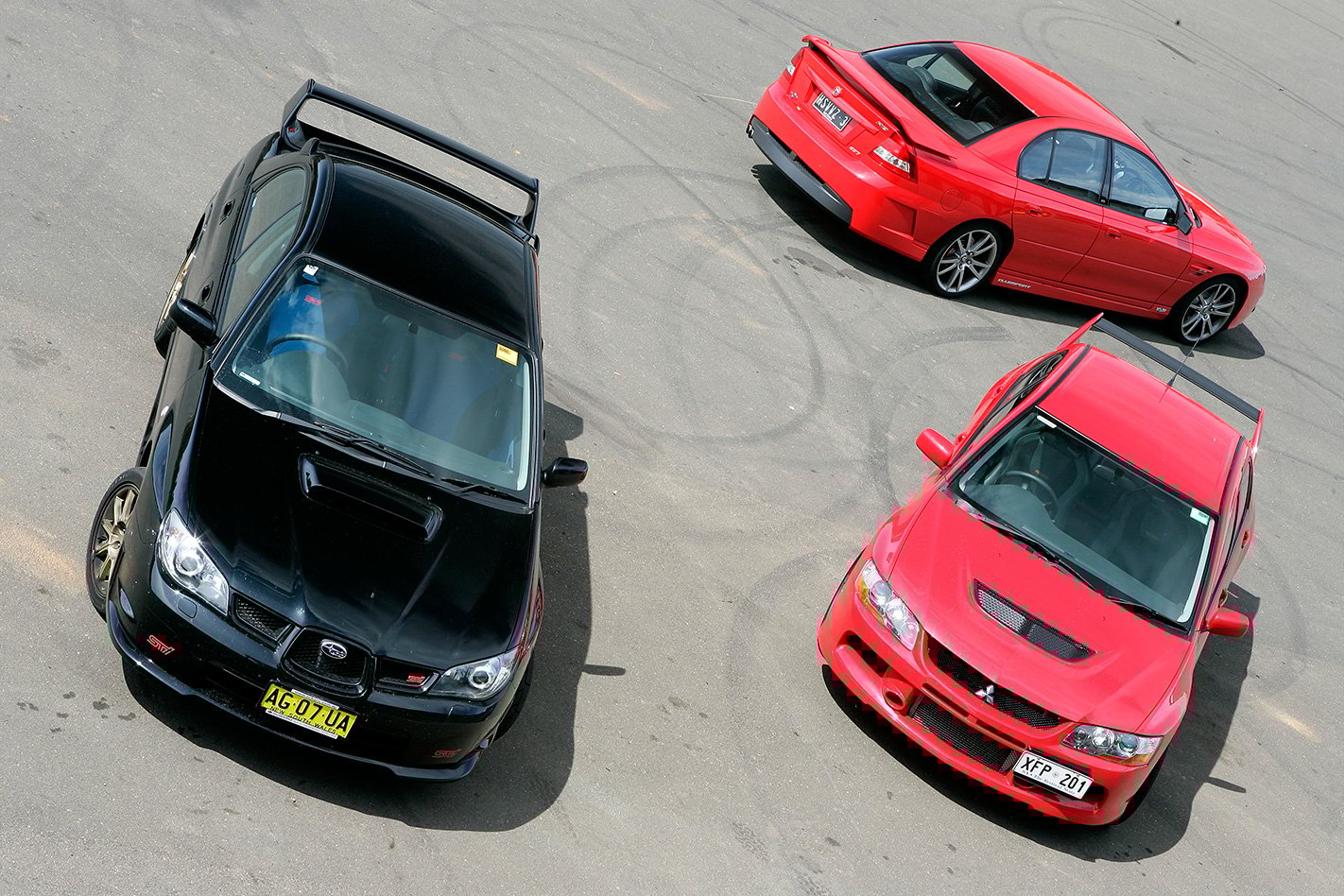 2005 Subaru WRX STi vs Mitsubishi Evo IX vs HSV Clubsport.jpg