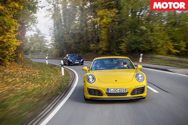 911 Carrera vs C63 S front driving