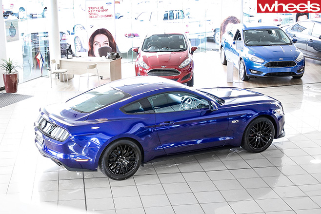 Tom -Elliott -first -Ford -Mustang -unveiling -side -rear