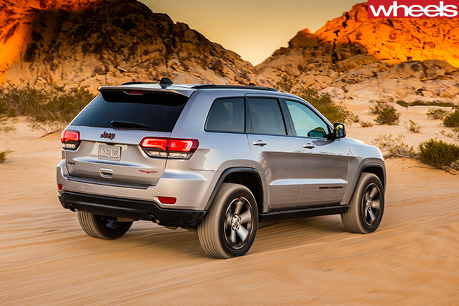 Jeep -Grand -Cherokee -Trailhawk -driving -rear -side