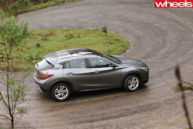 Infiniti -Q30-driving -rear -top -side