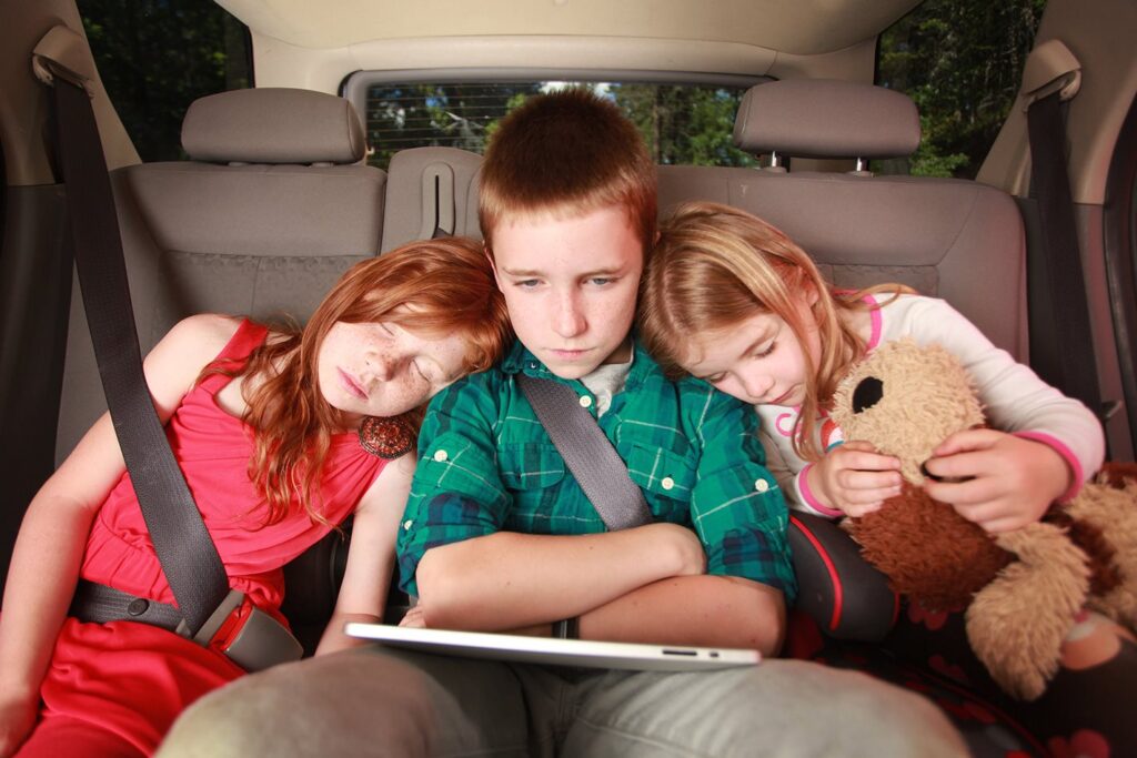 Children in backseat of car