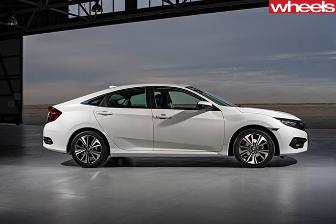 Honda -Civic -VTi -LX-rear -side -on -road