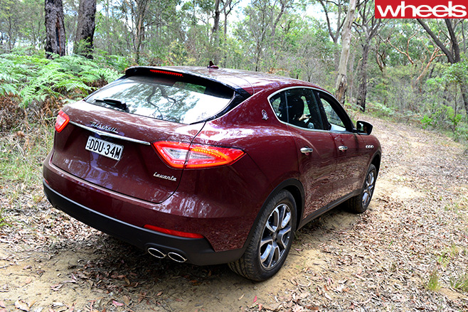 2017-Maserati -Levante -driving -rear