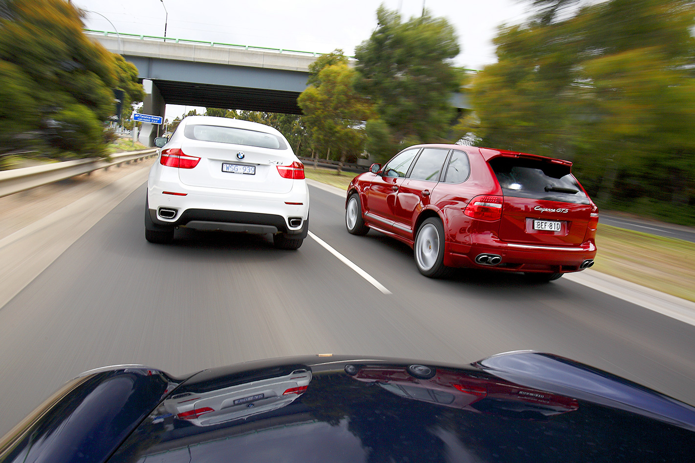Porsche Cayenne GTS vs BMW X6 rear