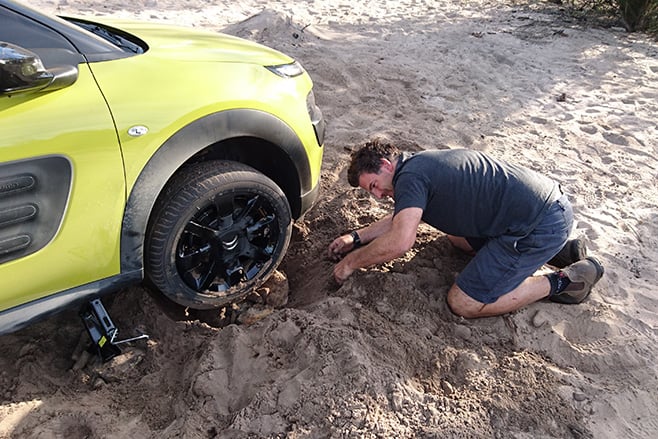 Citroen C4 Cactus rocks under wheel