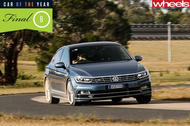 VW-Passat -driving -around -corner