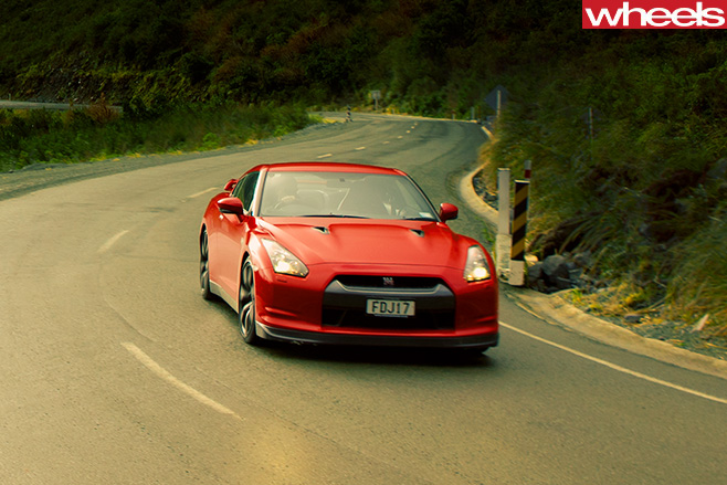 Nissan -GT-R-rear -driving -road