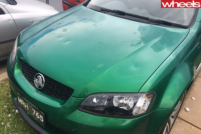 Hail -damage -on -Holden -Commodore -smashed -bonnet