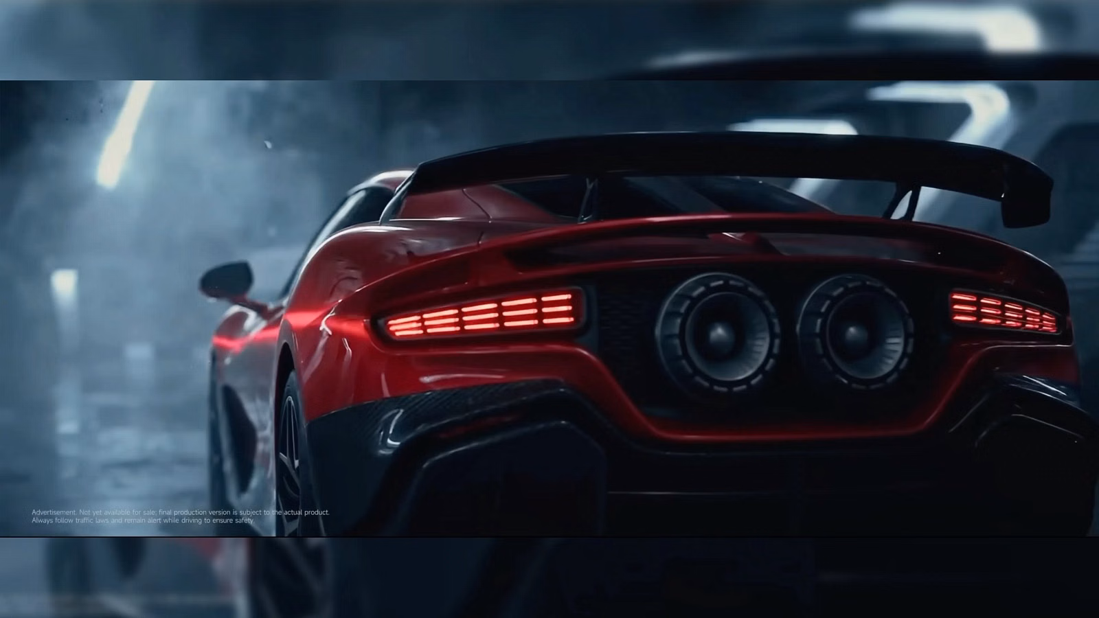 Red sports car viewed from the rear in a dim, industrial setting, with illuminated taillights and a large rear spoiler