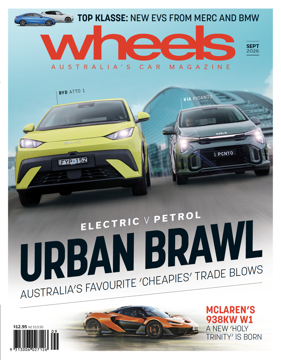 Wheels Australia cover showing yellow BYD ATTO 1 and green Kia Picanto racing, with the 'Urban Brawl' headline and 'Electric vs Petrol' subtitle.