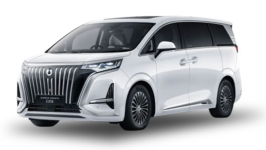 White minivan with a bold chrome grille, sleek headlights, and dark-tinted windows.