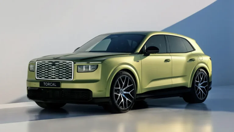 Front three-quarter view of a lime-green Bentley Torcal SUV in a studio setting, showing its bold grille and large alloy wheels