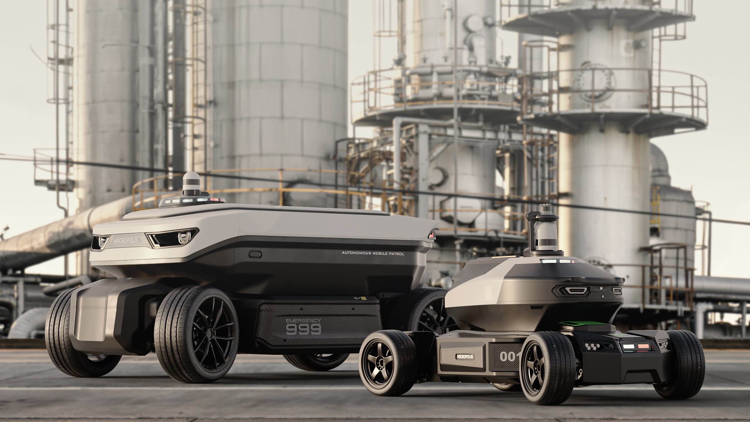 Autonomous mobile patrol robots parked in a large industrial facility with steel towers, pipes, and catwalks in the background, ready for deployment