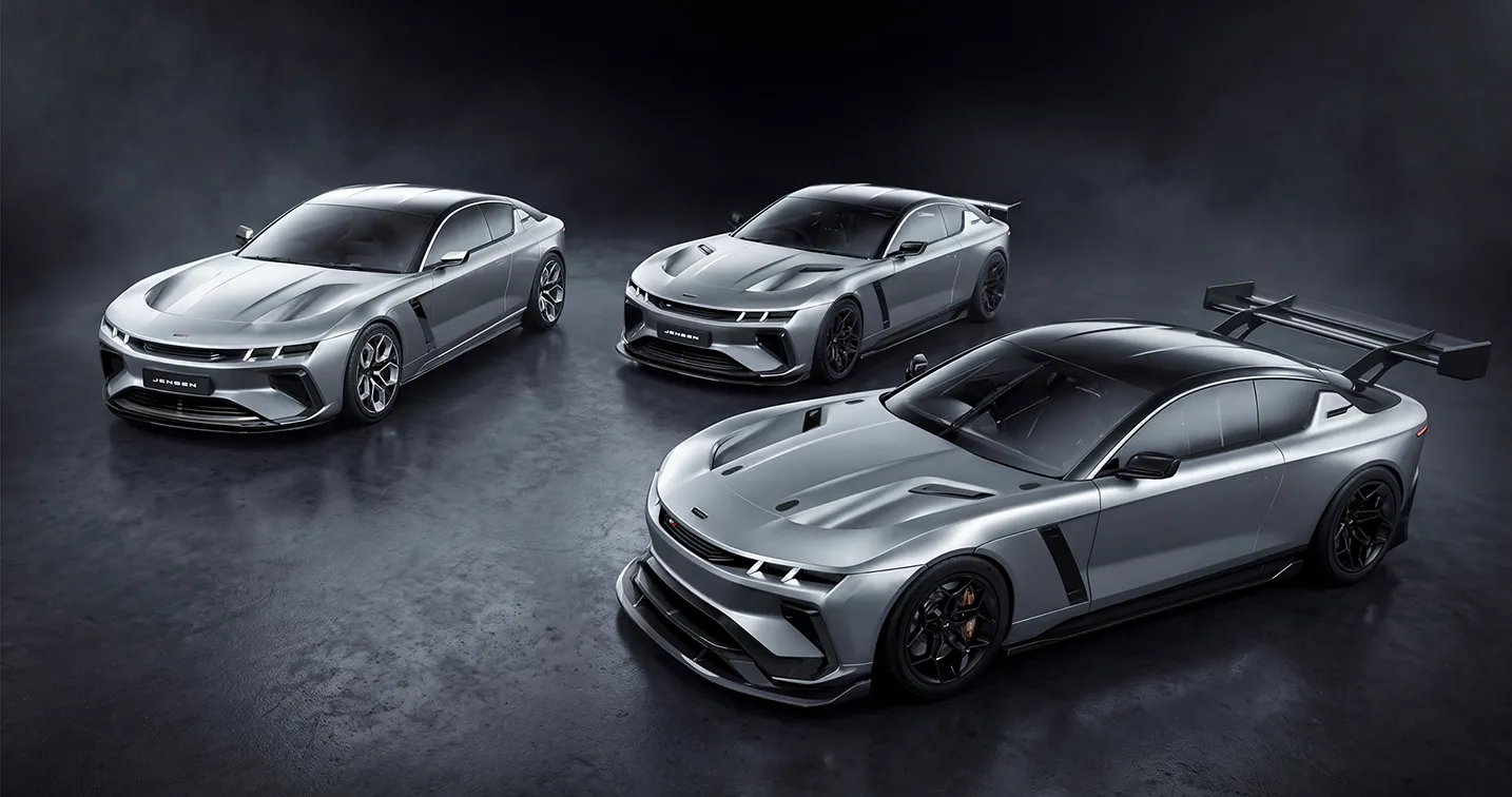 Three silver high-performance sports cars in a dark studio, one with a large rear wing on the rightmost vehicle.