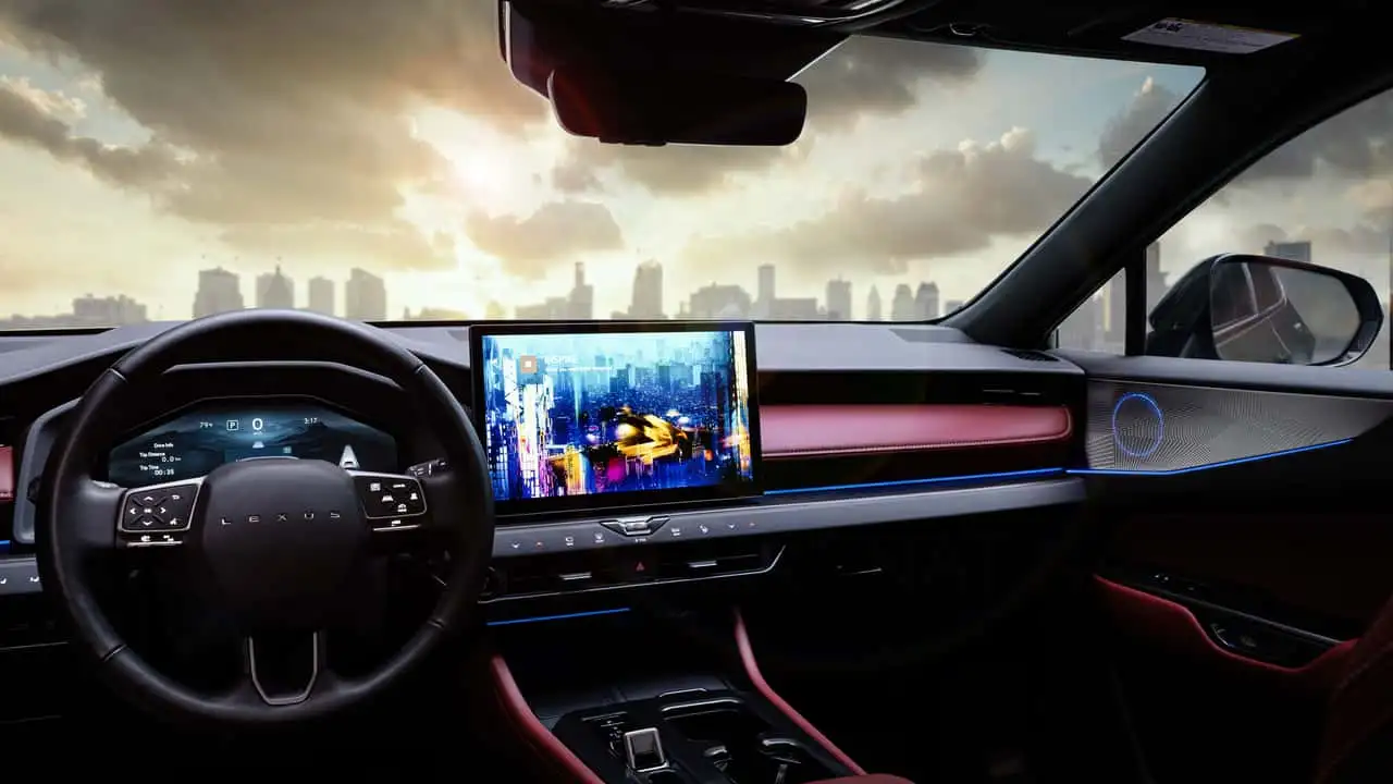 Interior of a modern car cockpit with a large central touchscreen showing a cityscape, steering wheel on the left, blue ambient lighting.