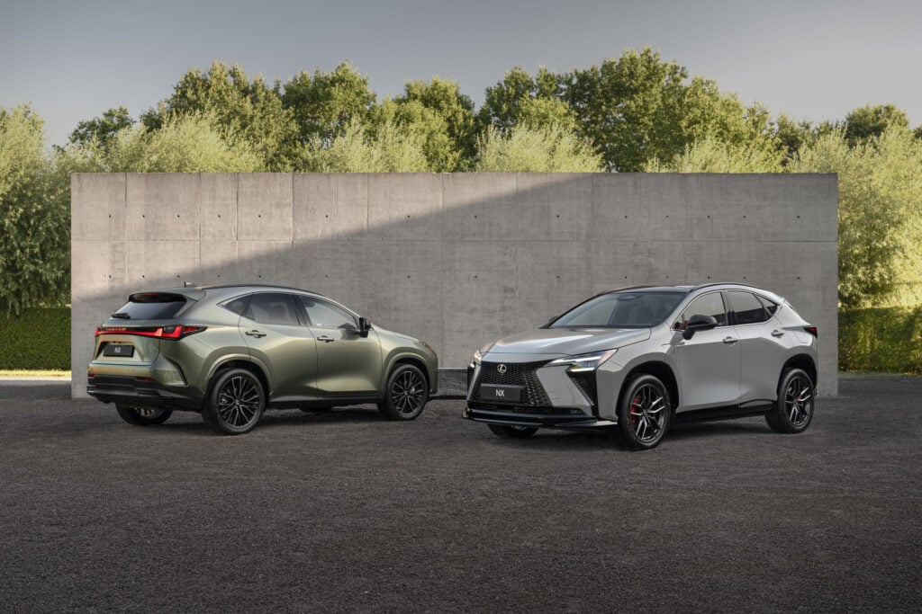 Two Lexus NX SUVs parked side by side in a lot, green on the left and silver on the right, with a concrete wall and trees behind.”, “Green and silver Lexus NX crossovers parked parallel in front of a tall concrete barrier.”, “A green Lexus NX and a silver Lexus NX in a parking area, with a concrete wall and greenery in the background.”, “Two luxury crossover SUVs (Lexus NX) displayed in a lot beside a gray concrete wall.”, “Silver Lexus NX (front) and green Lexus NX (rear) parked next to a concrete barrier with trees in the backdrop.”]} }{}{