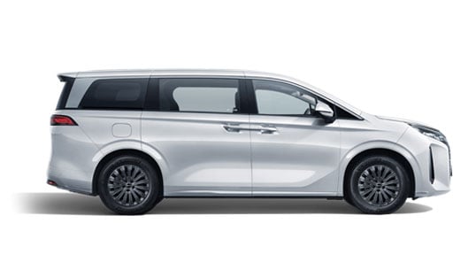 Side view of a silver minivan with sliding doors and tinted windows