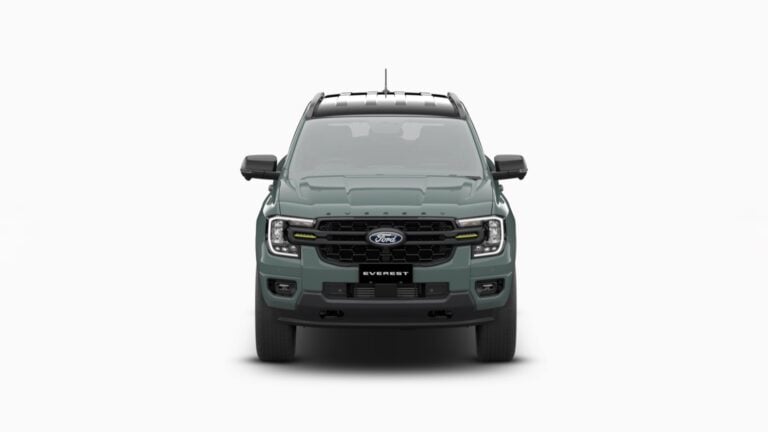 Front view of a green Ford Everest SUV showing its grille, headlights, and bold bumper.