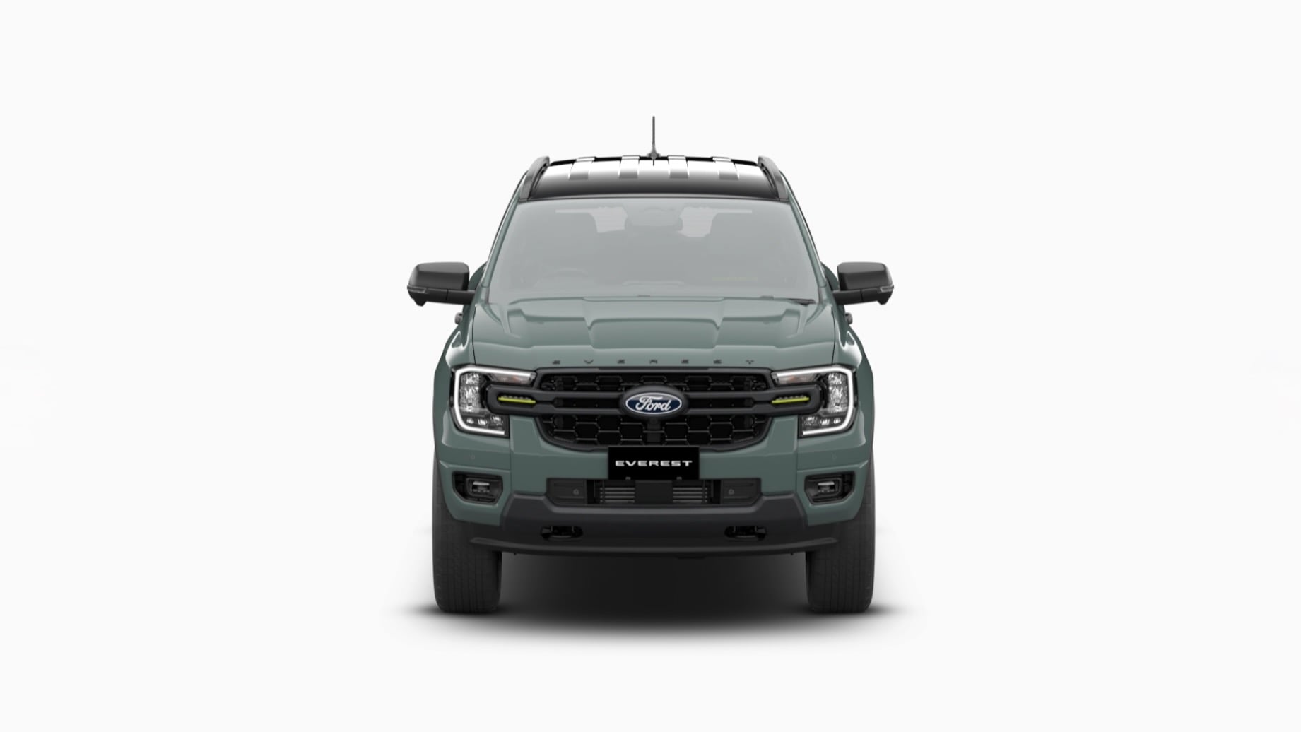 Front view of a green Ford Everest SUV showing its grille, headlights, and bold bumper.