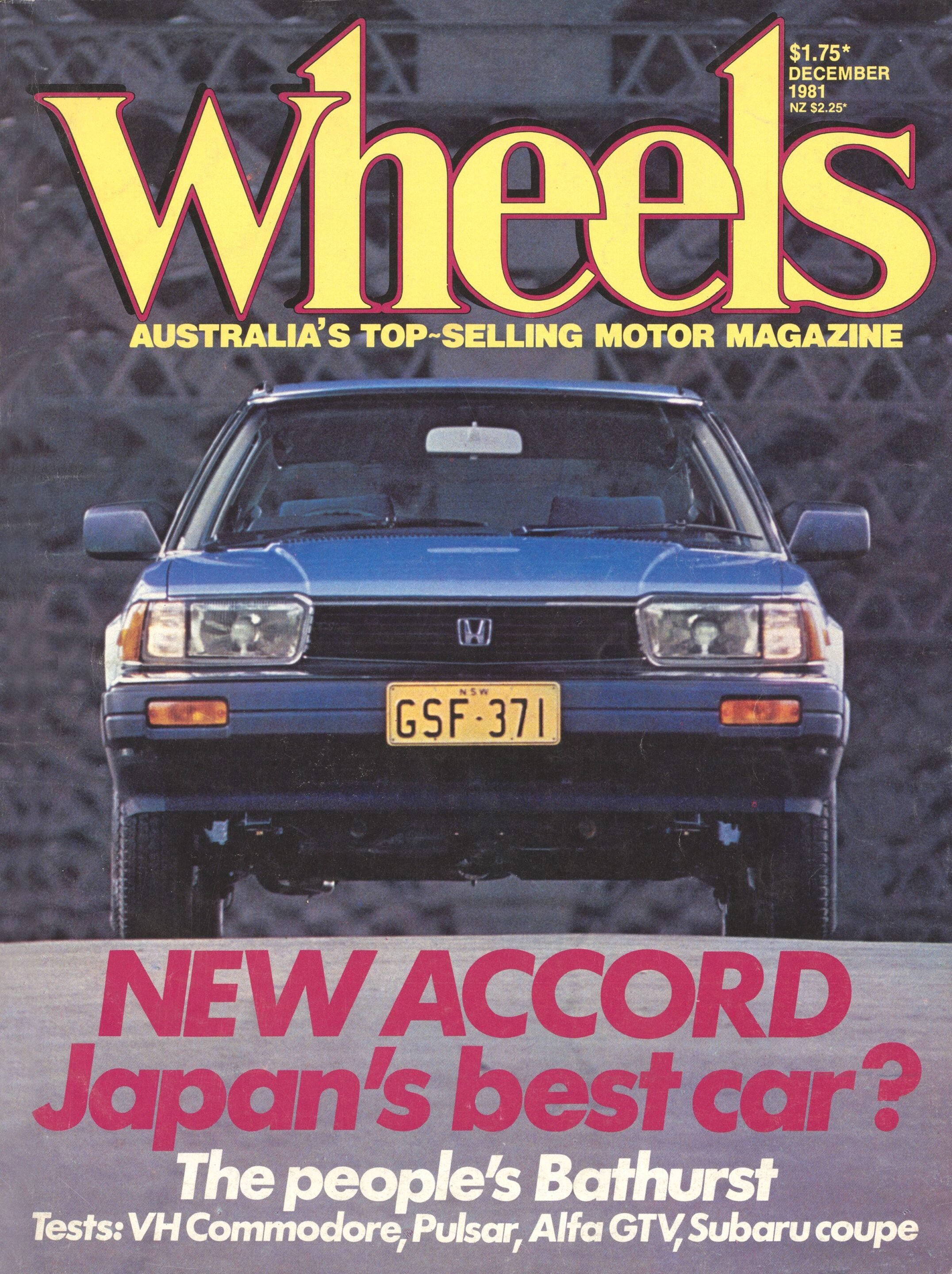 Front cover of Wheels magazine showing a blue SUV from the front, with a large yellow 'Wheels' logo and the subtitle 'Australia's top-selling motor magazine'